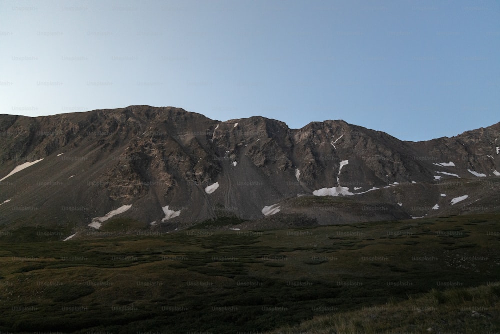 a mountain range with snow on the top of it