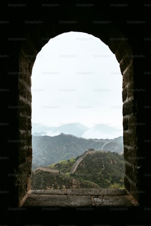 a view of the great wall of china through a window