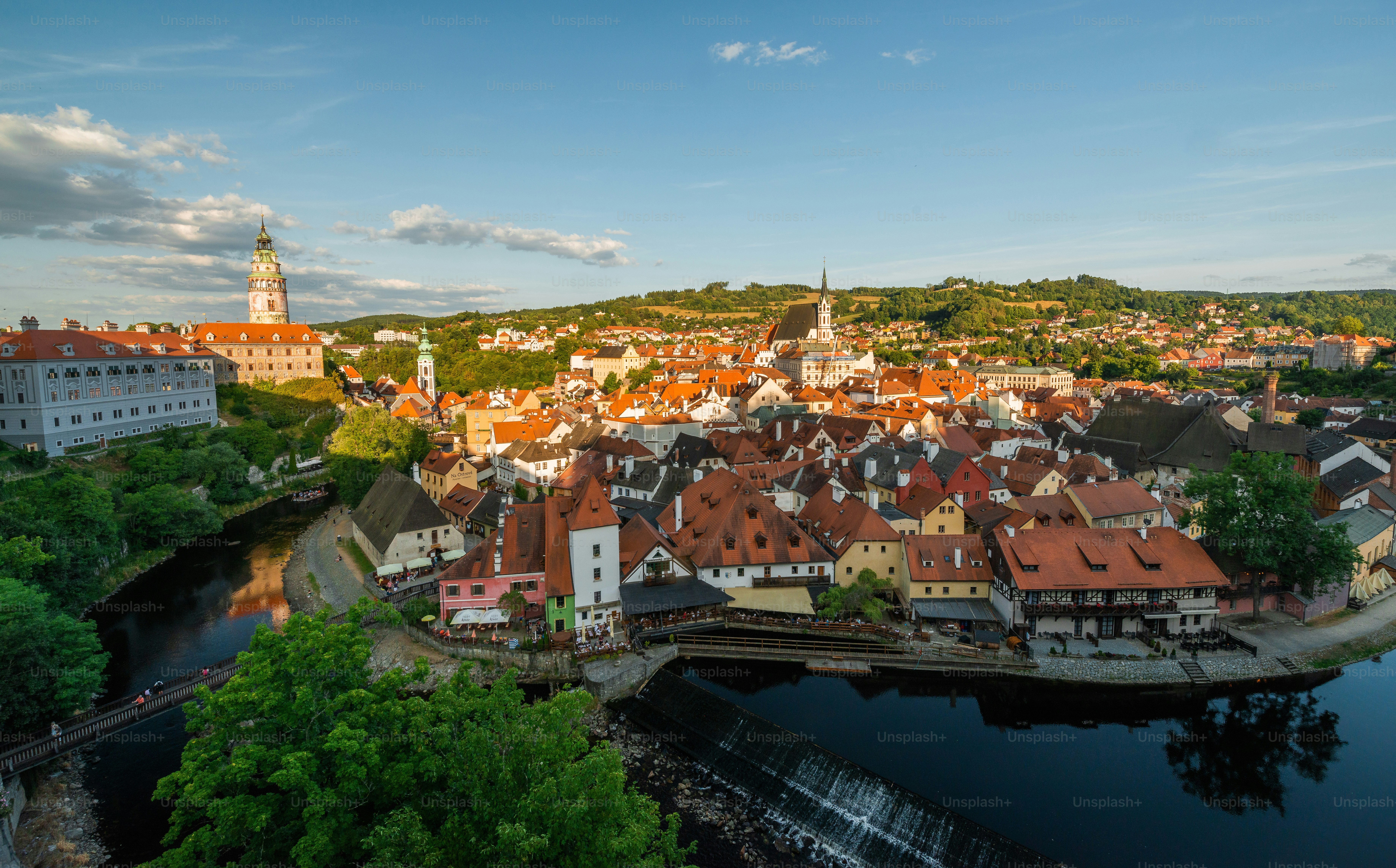 an aerial view of a city with a river running through it