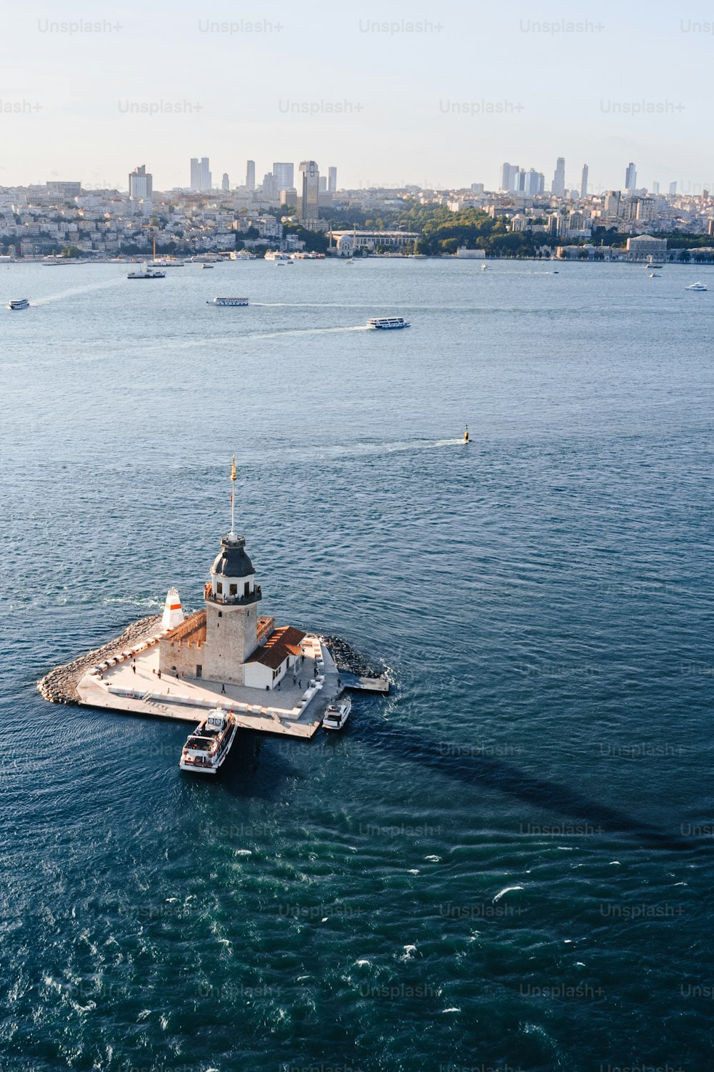 a small boat traveling across a large body of water