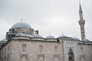 a large building with two towers and a clock