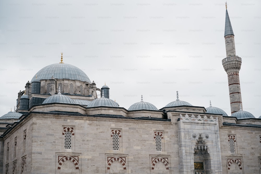 a large building with two towers and a clock