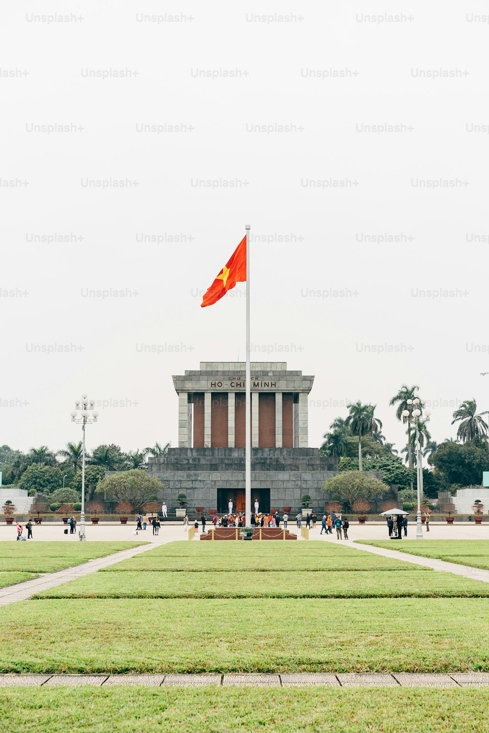 a flag is flying in front of a building