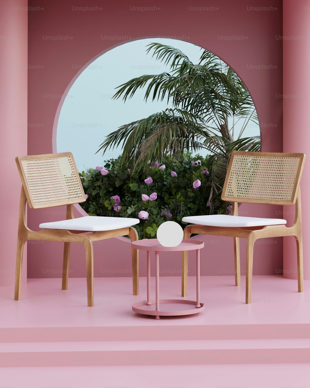 uma sala rosa com duas cadeiras e uma mesa