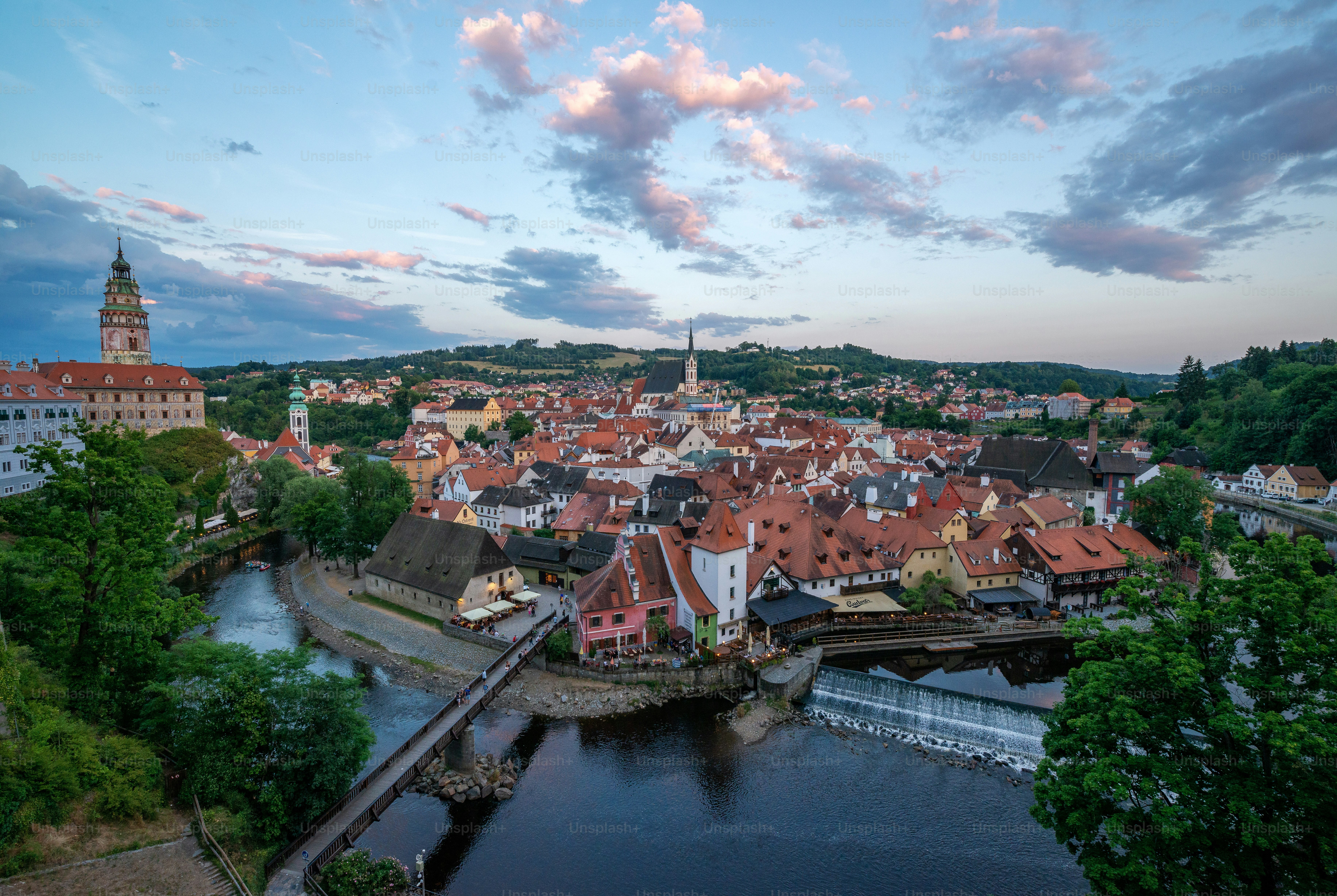 an aerial view of a city with a river running through it