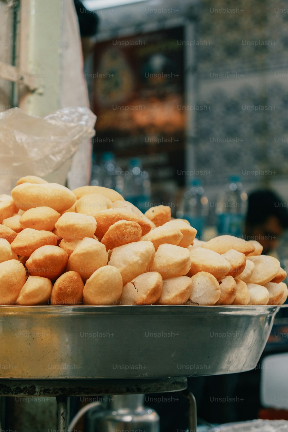 a metal bowl filled with lots of food