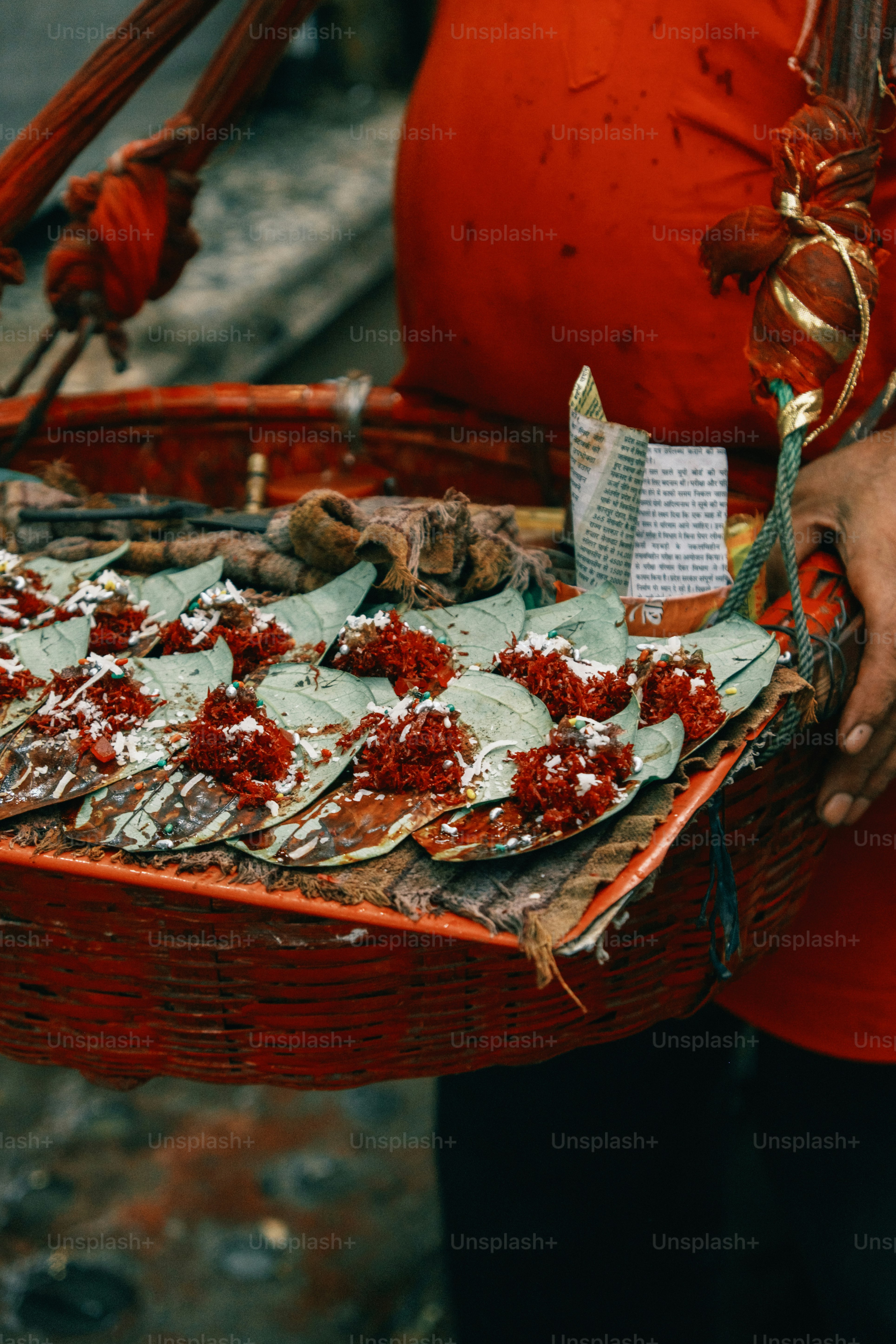 a person holding a basket filled with food