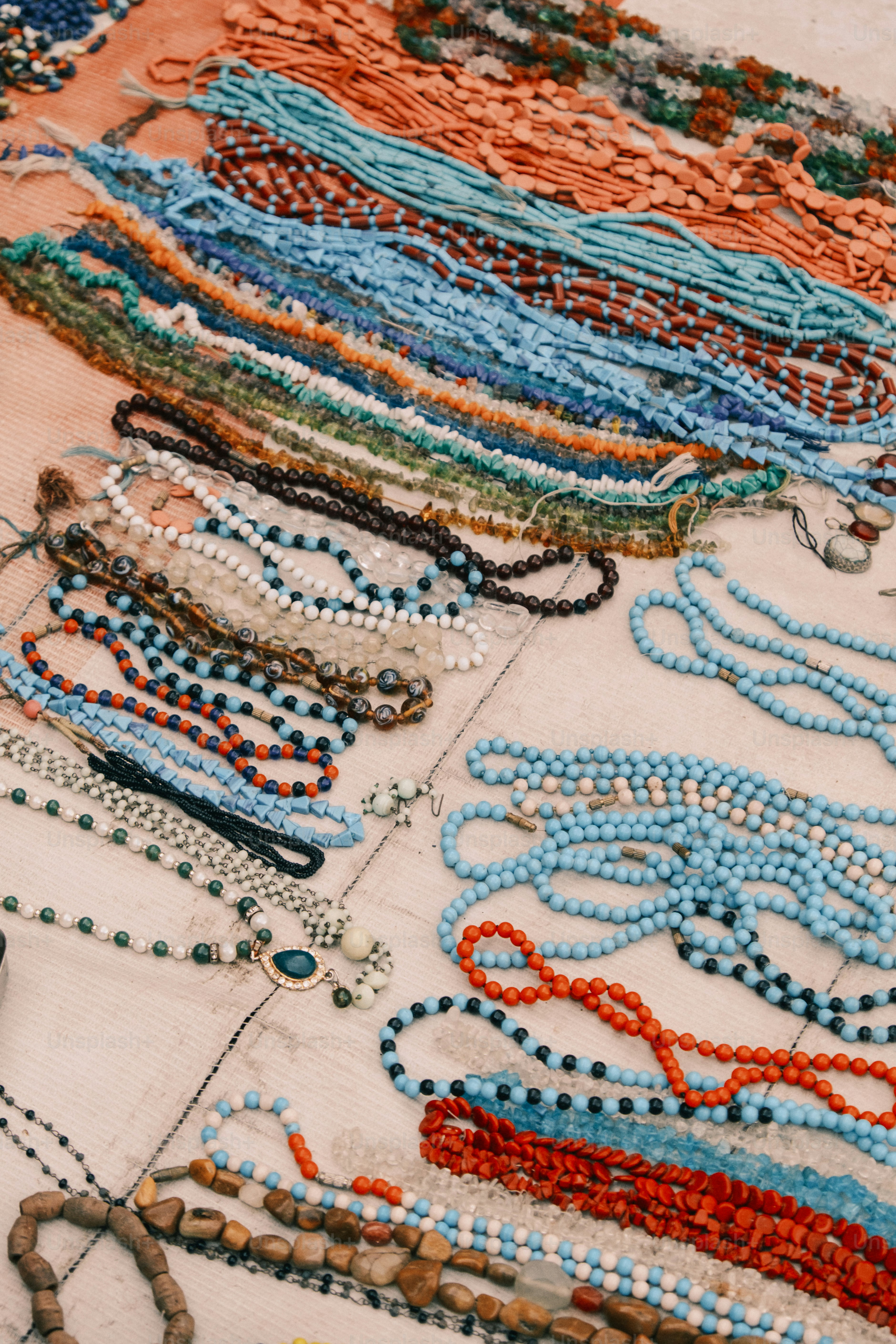 a close up of a bunch of beads on a table