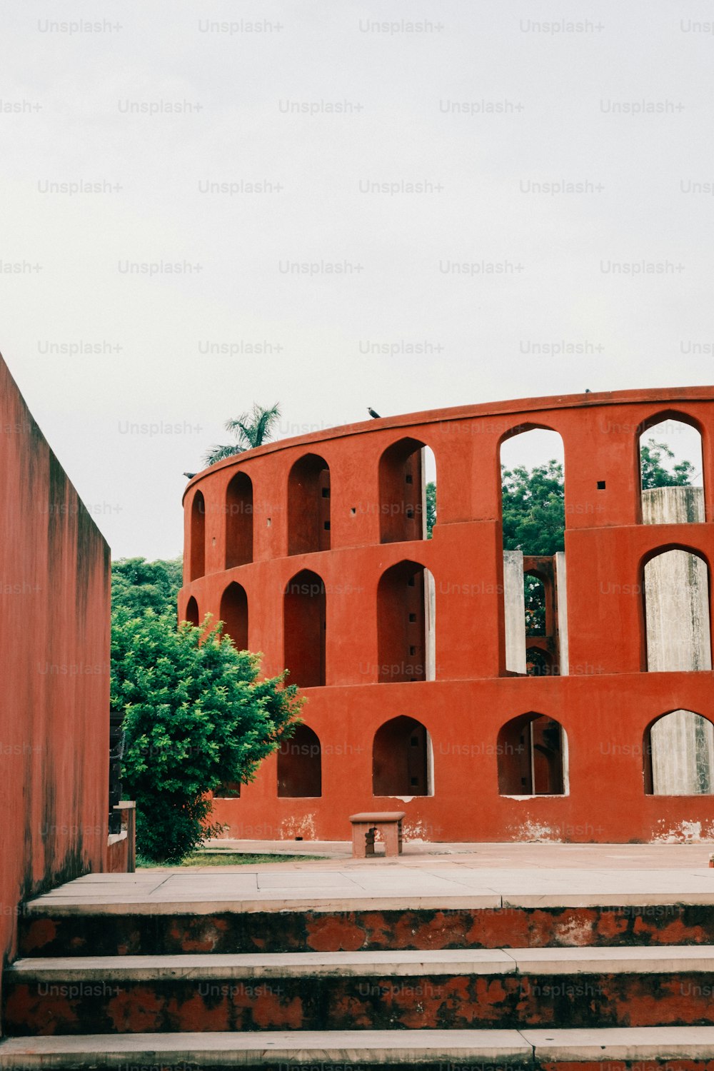 a red building with a bunch of windows on it