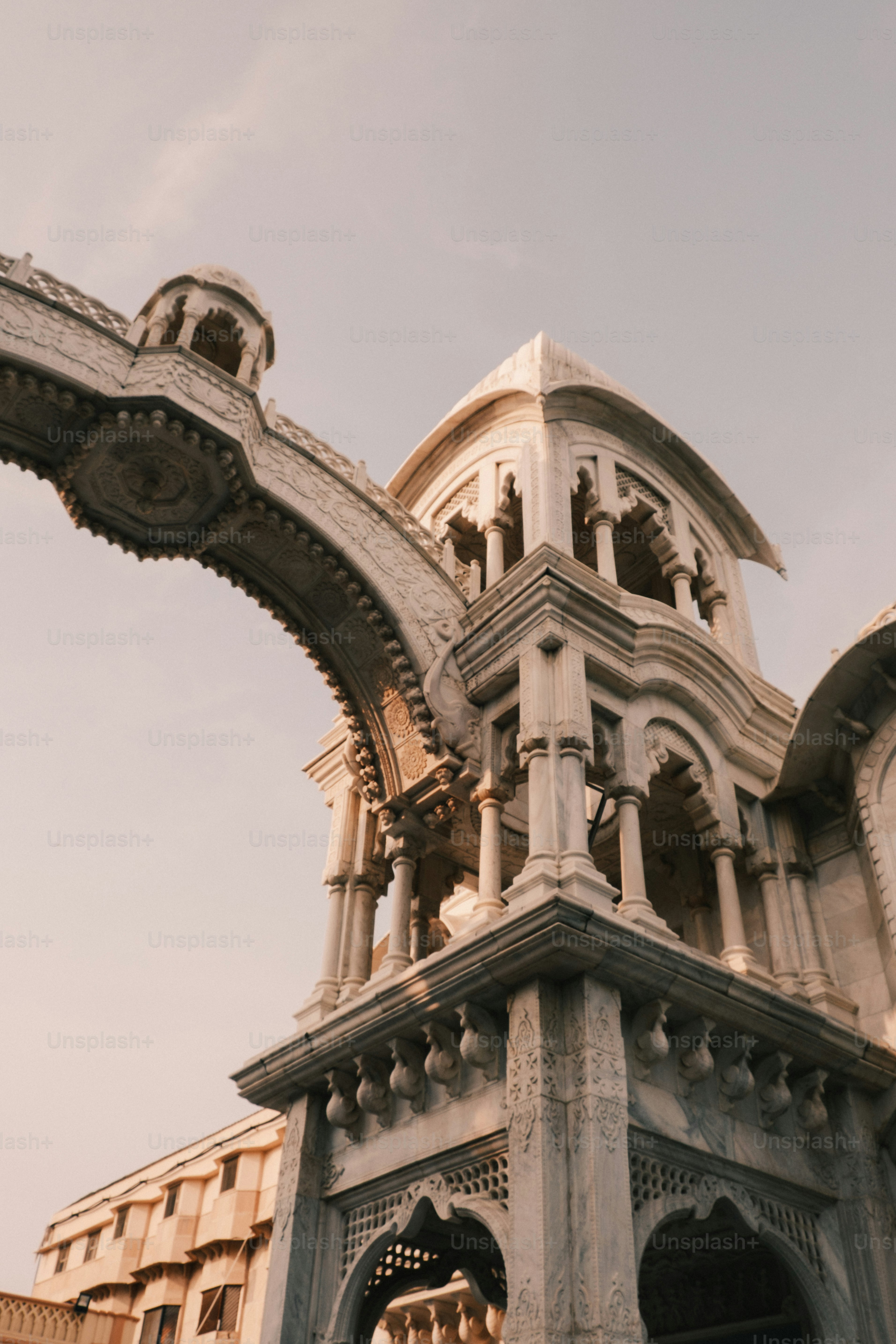 a tall building with a clock on the top of it