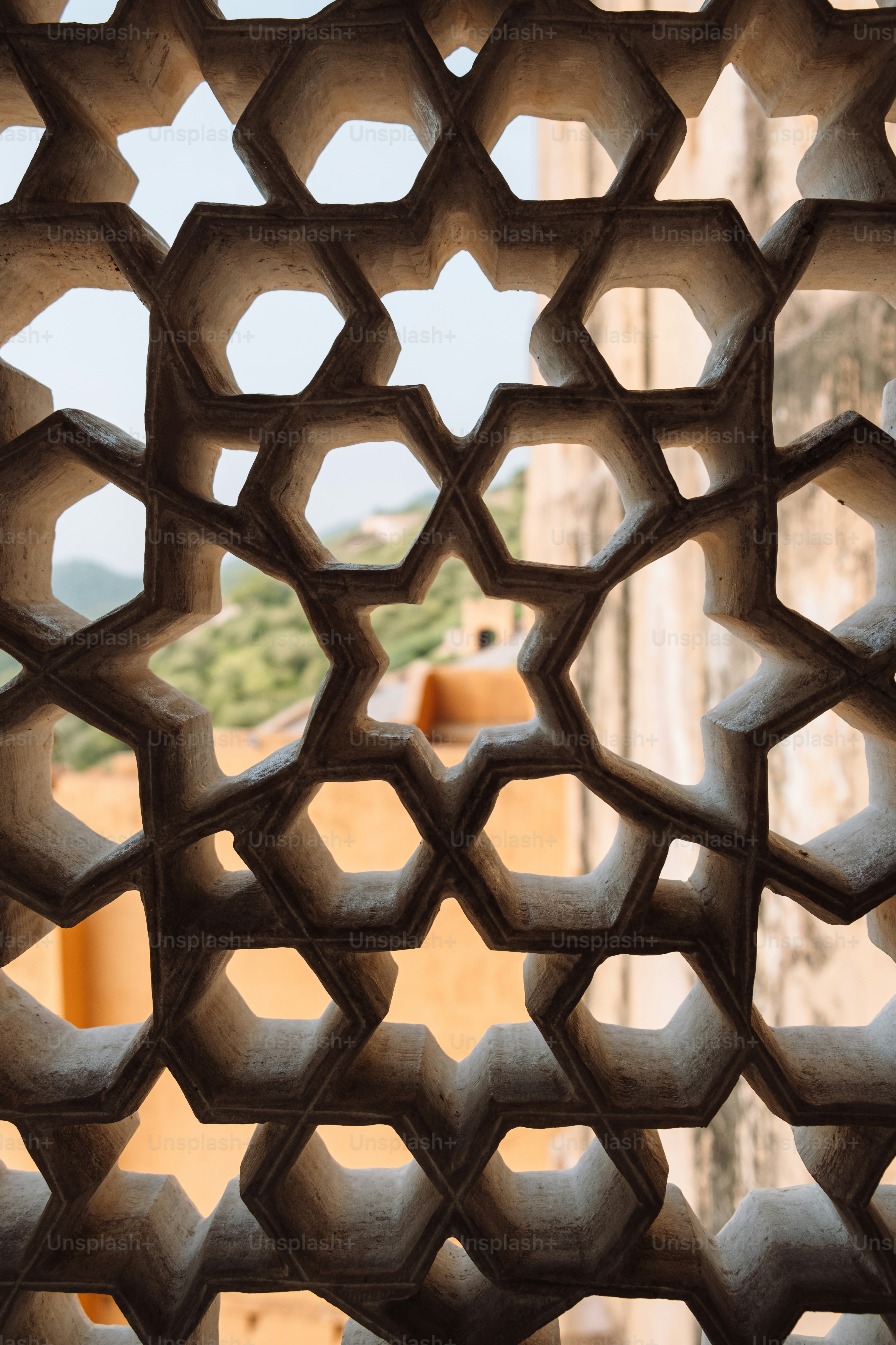 a close up of a building with a clock tower in the background