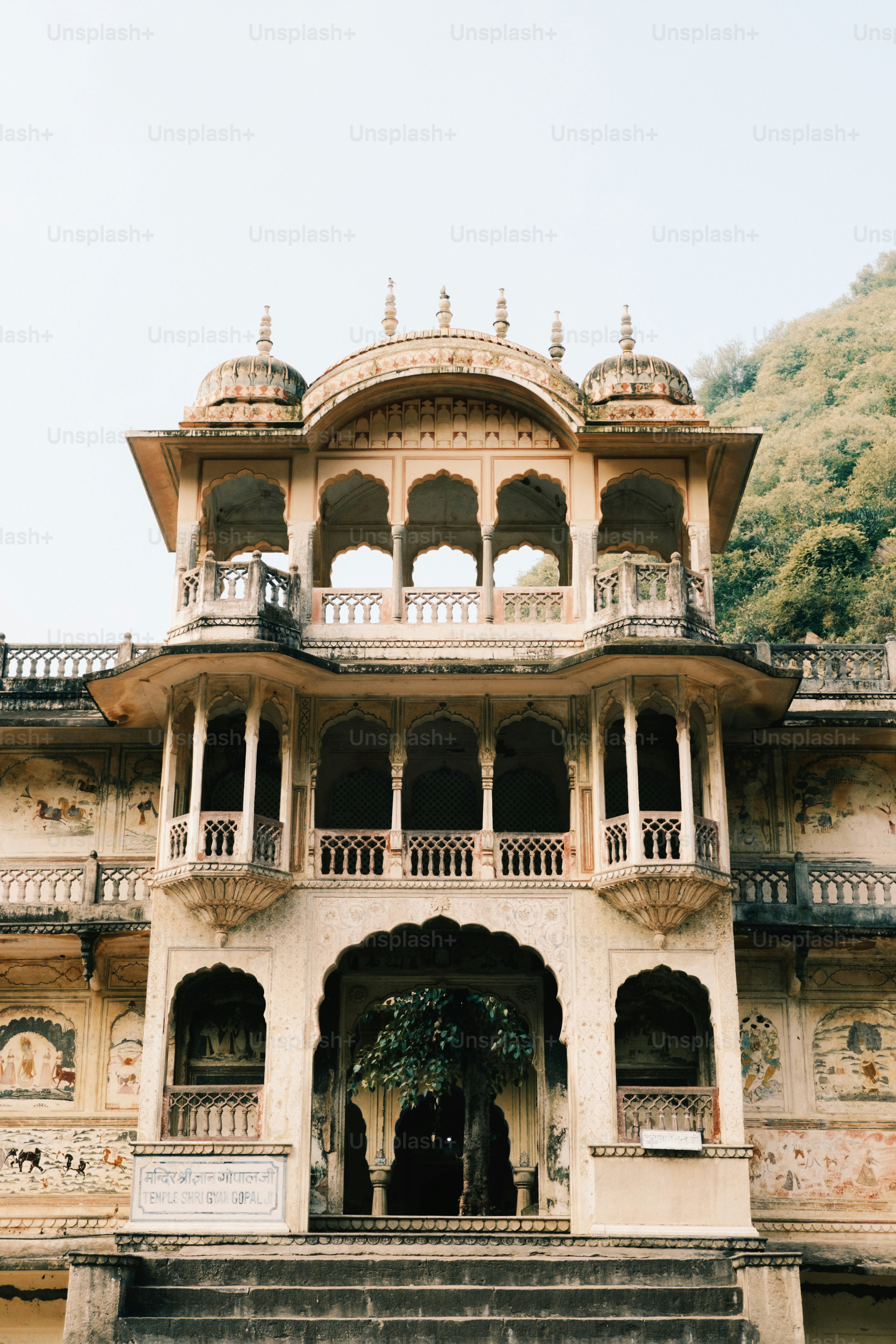 a large building with many balconies on top of it