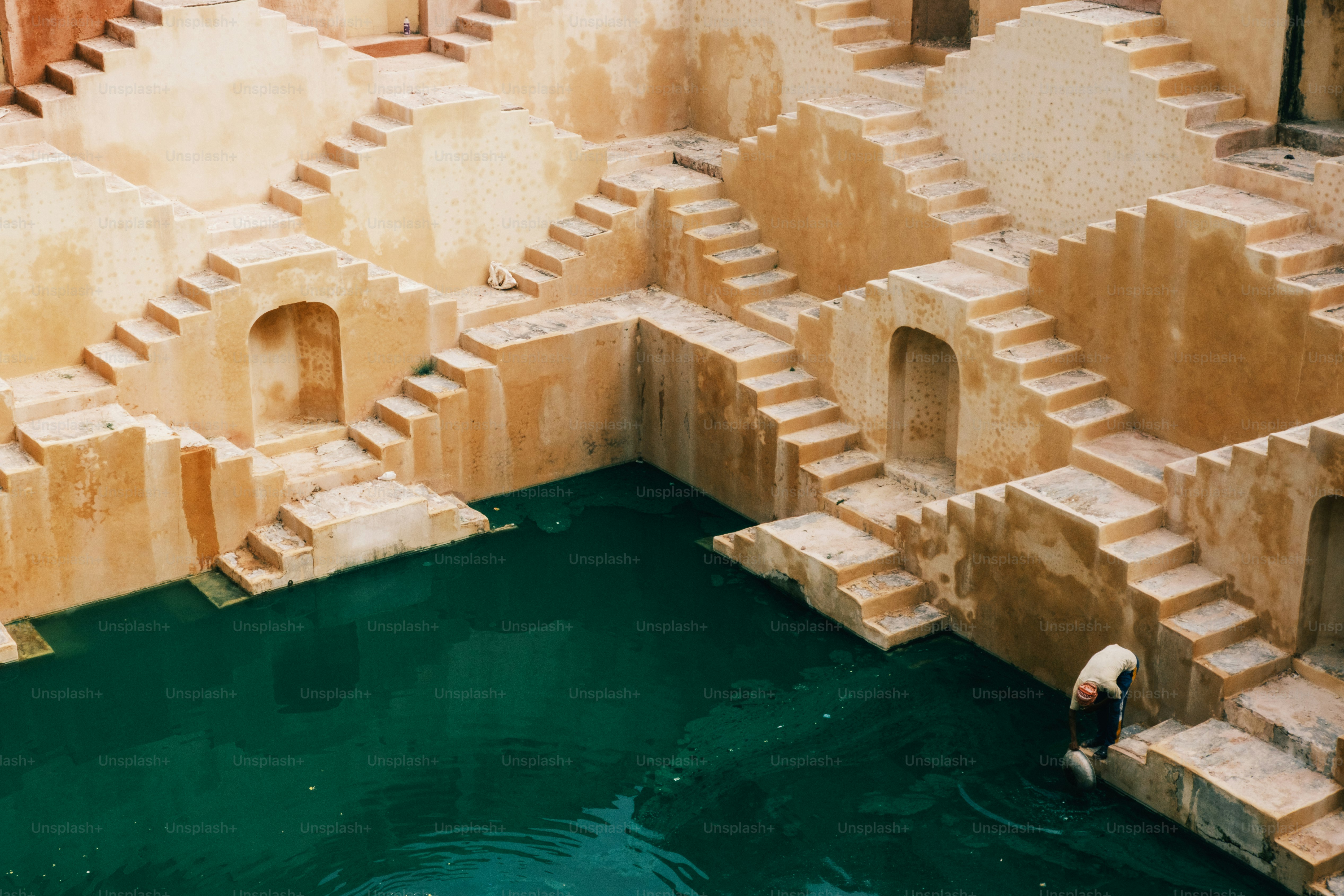 a man is standing in a pool of water