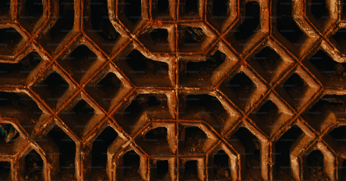 Deep Metal Struct A close up view of a metal structure photo – Landmark Image on Unsplash