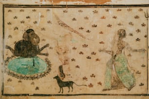 une peinture d’une femme et d’un chien sur un mur