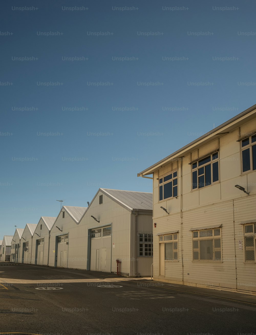 a row of white buildings sitting next to each other