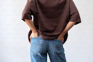 a person standing with their back to the camera