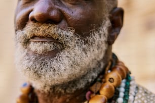 a close up of a person wearing a necklace