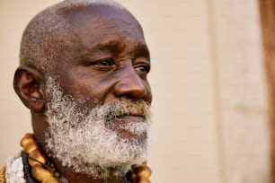 a close up of a person wearing a necklace