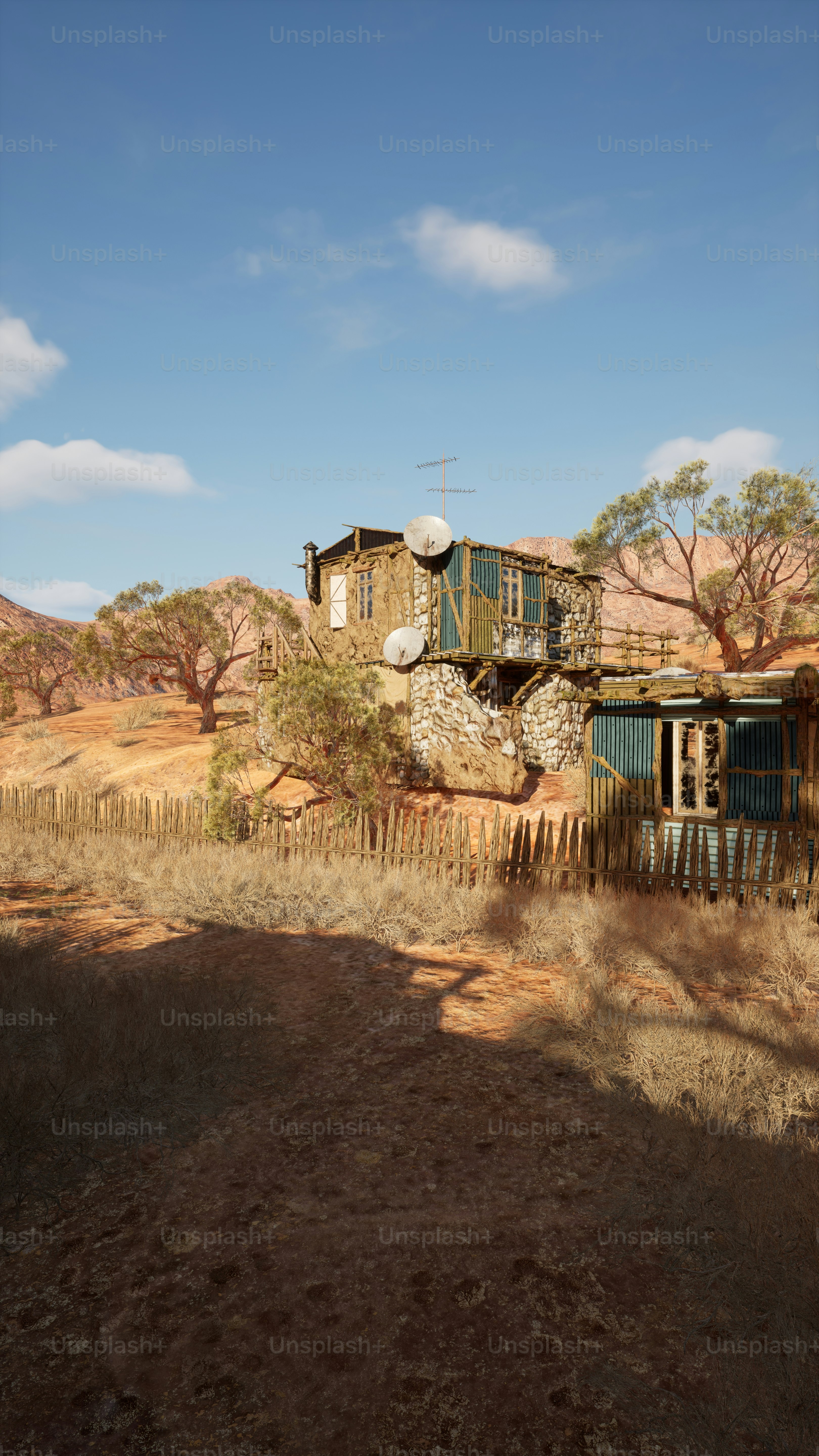 a house in the middle of a dry grass field