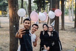 a group of people standing next to each other