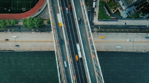 an aerial view of a bridge over a body of water