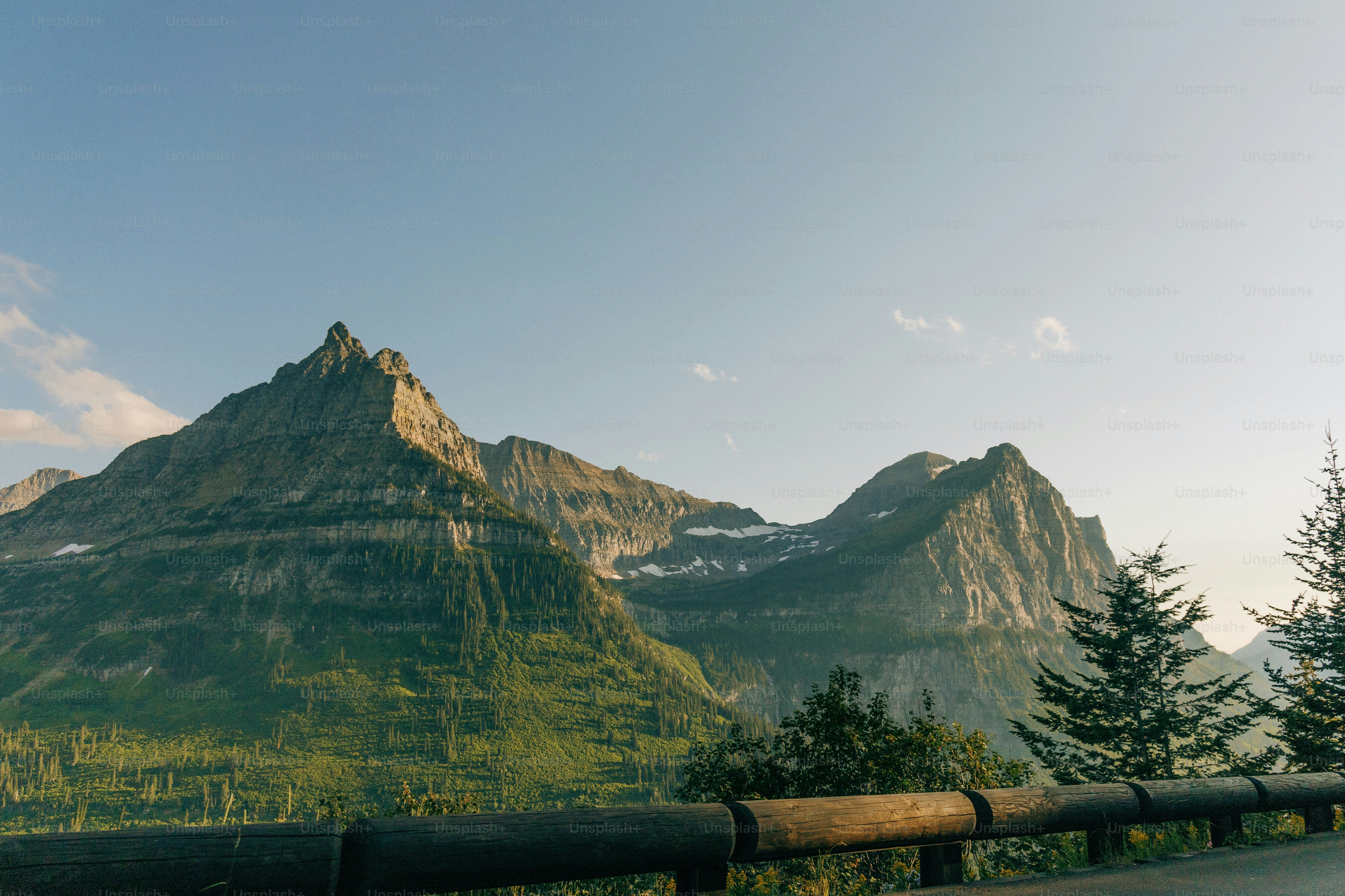 a view of a mountain range from a highway