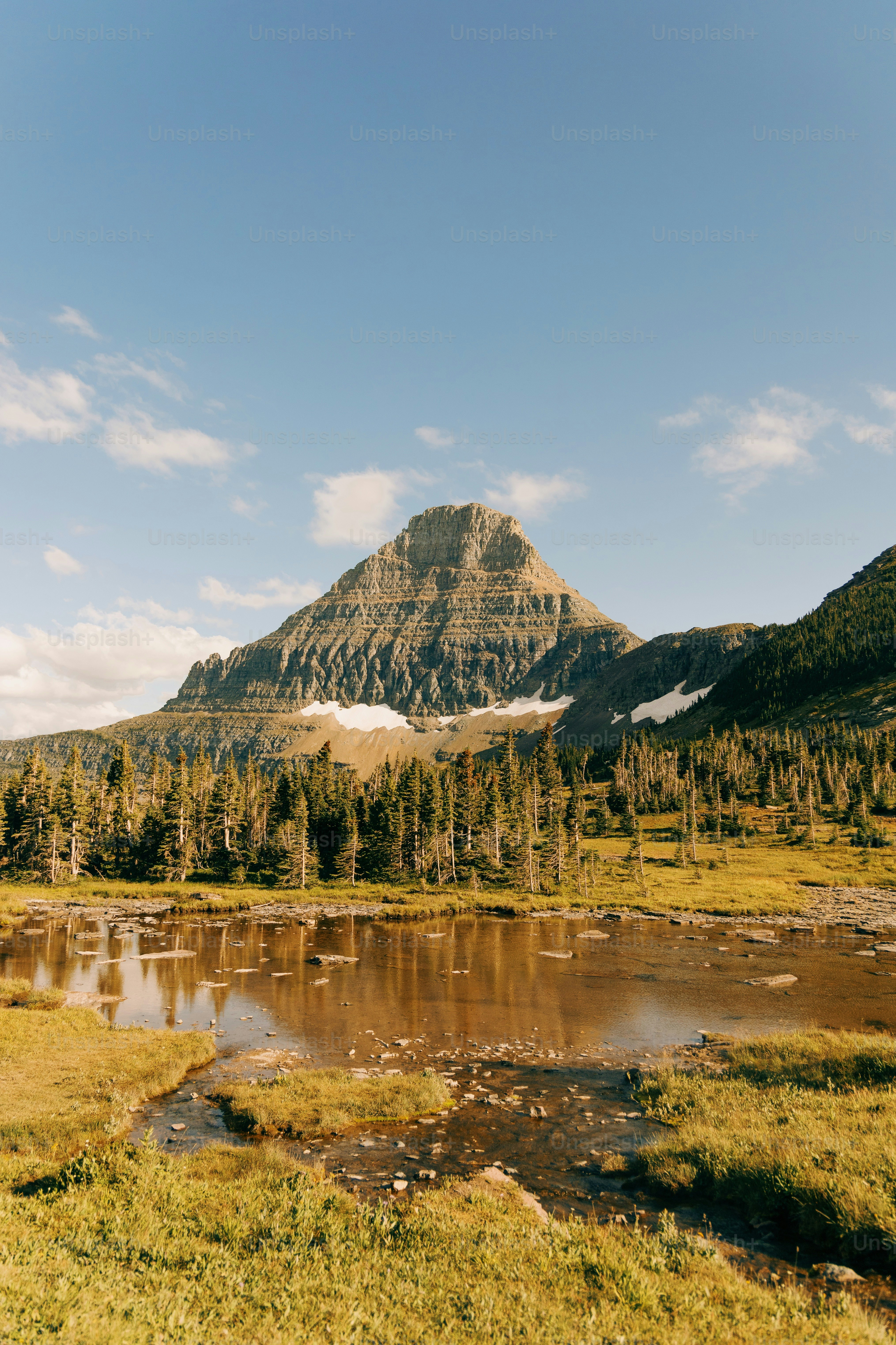 a mountain with a lake in front of it