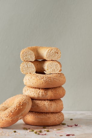 a stack of bagels sitting on top of each other