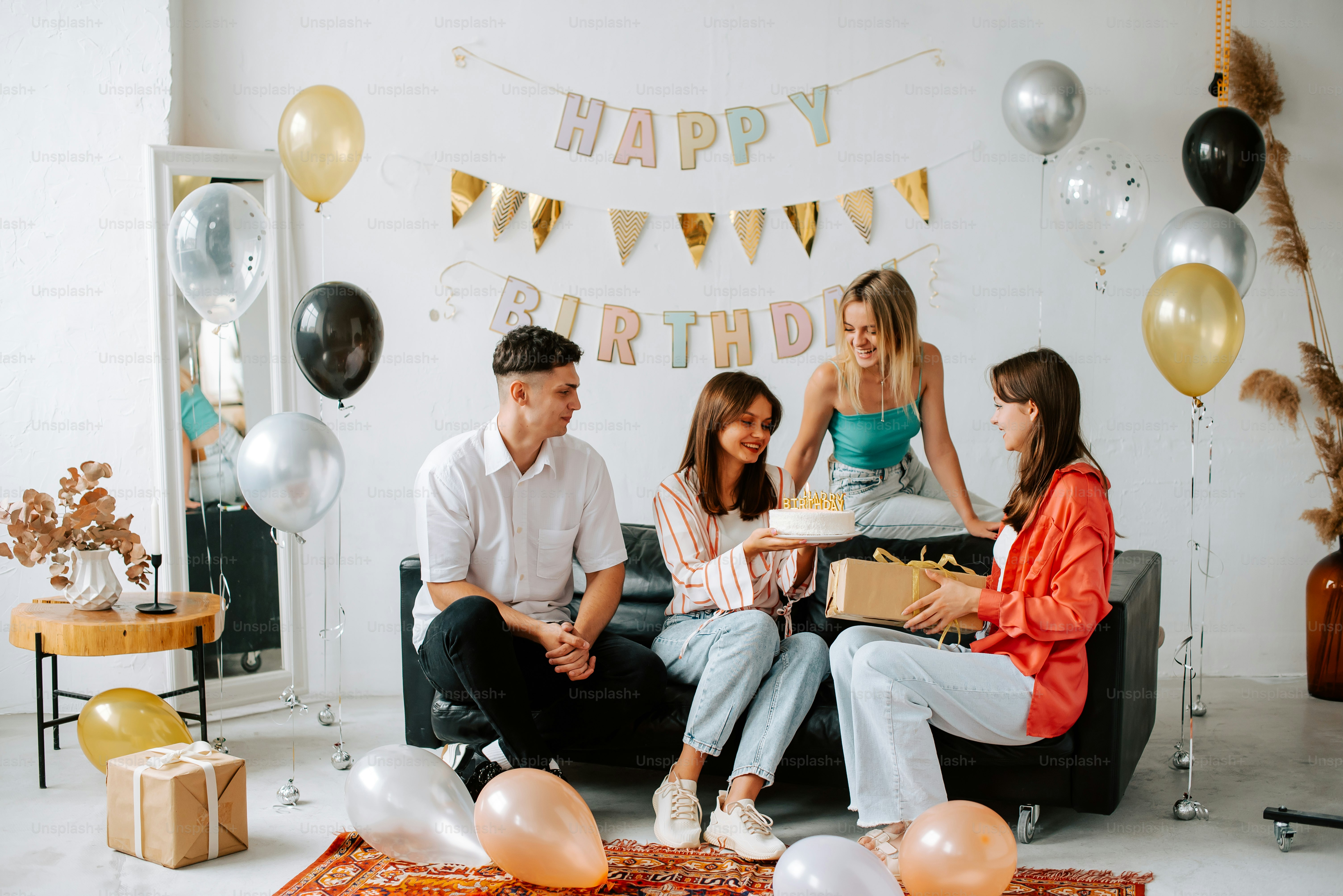 a group of people sitting on top of a couch