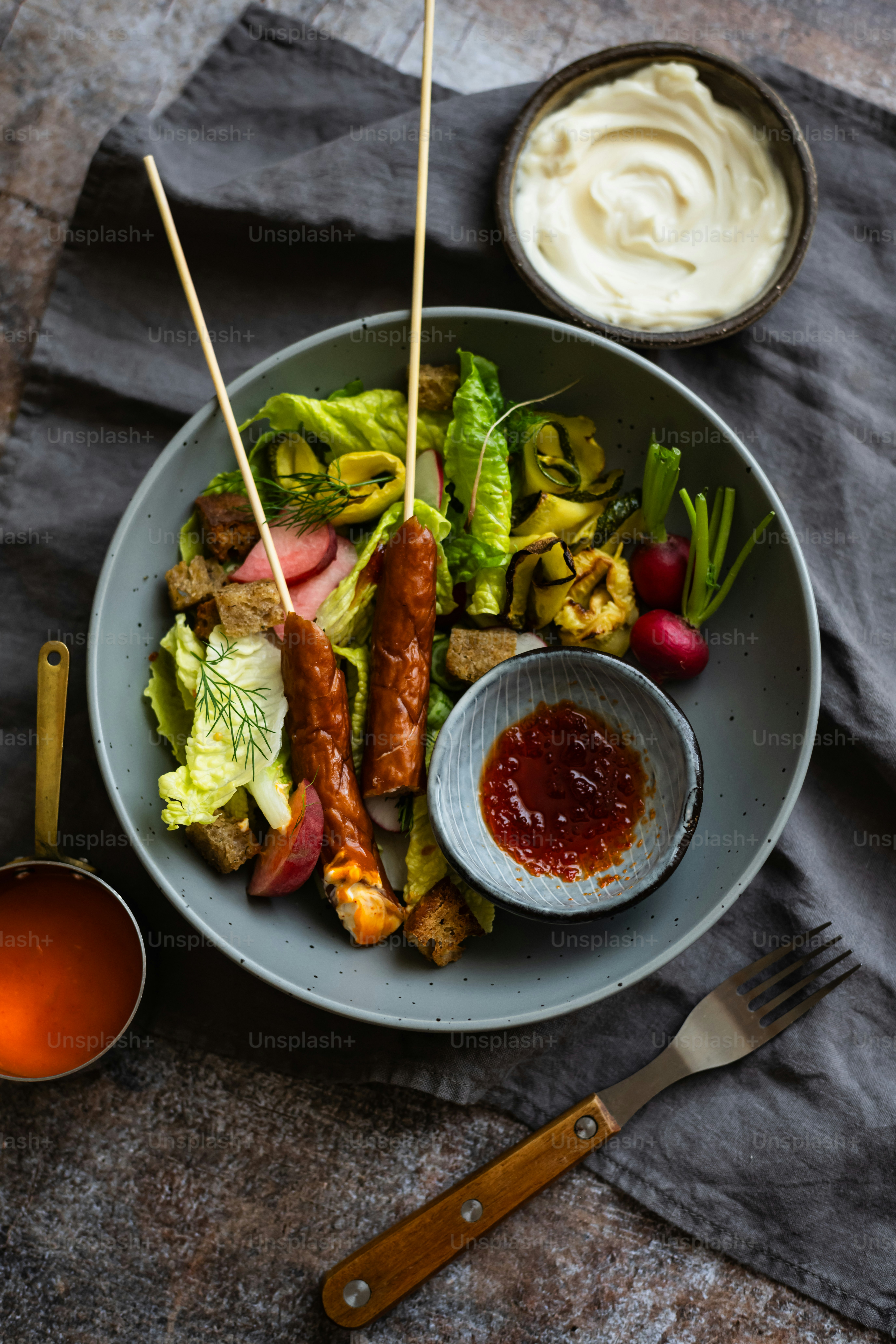 a plate of food with meat and vegetables