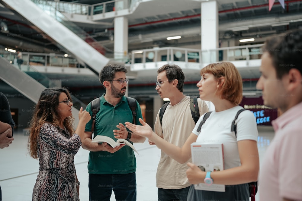 a group of people standing around each other