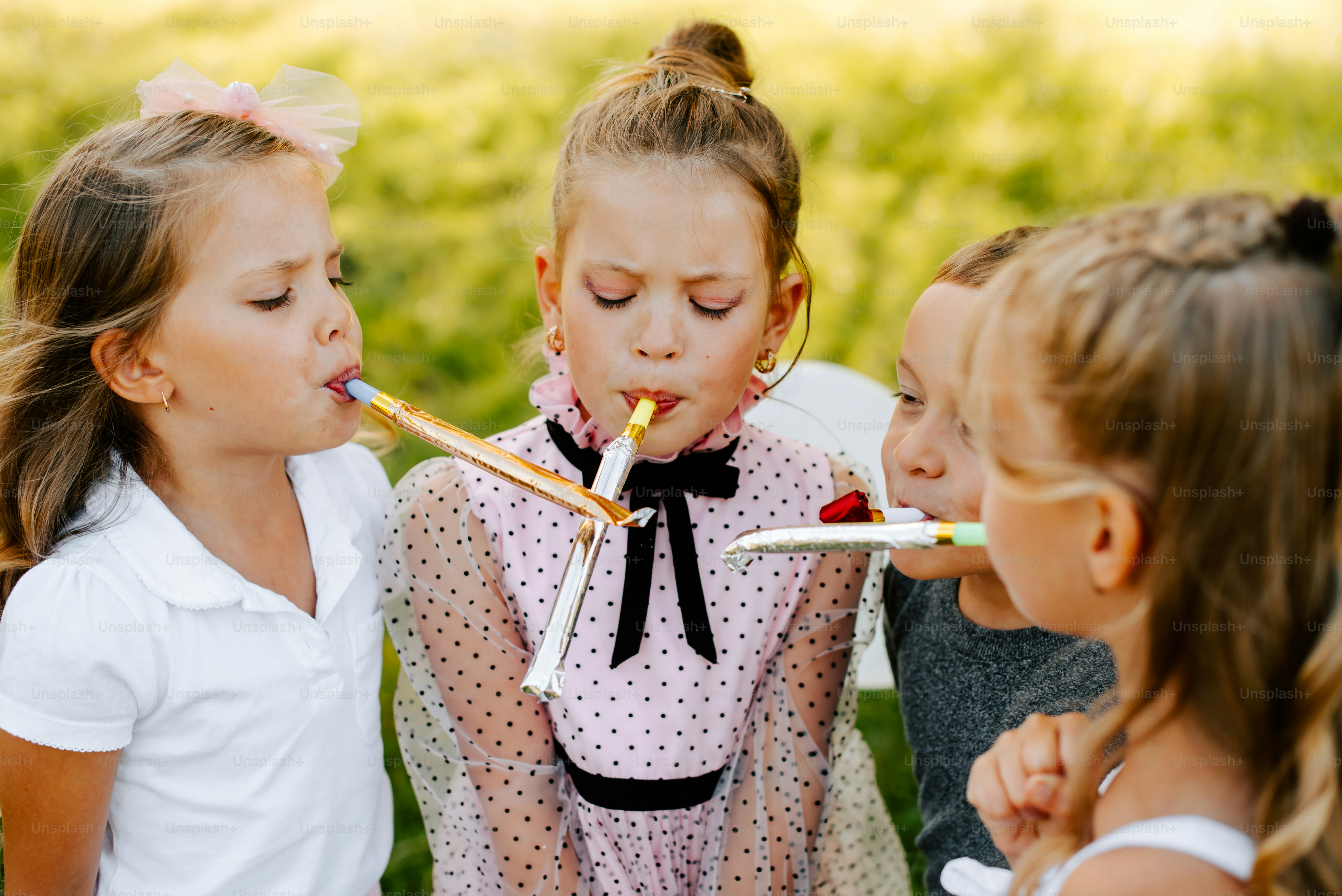a group of young girls standing next to each other