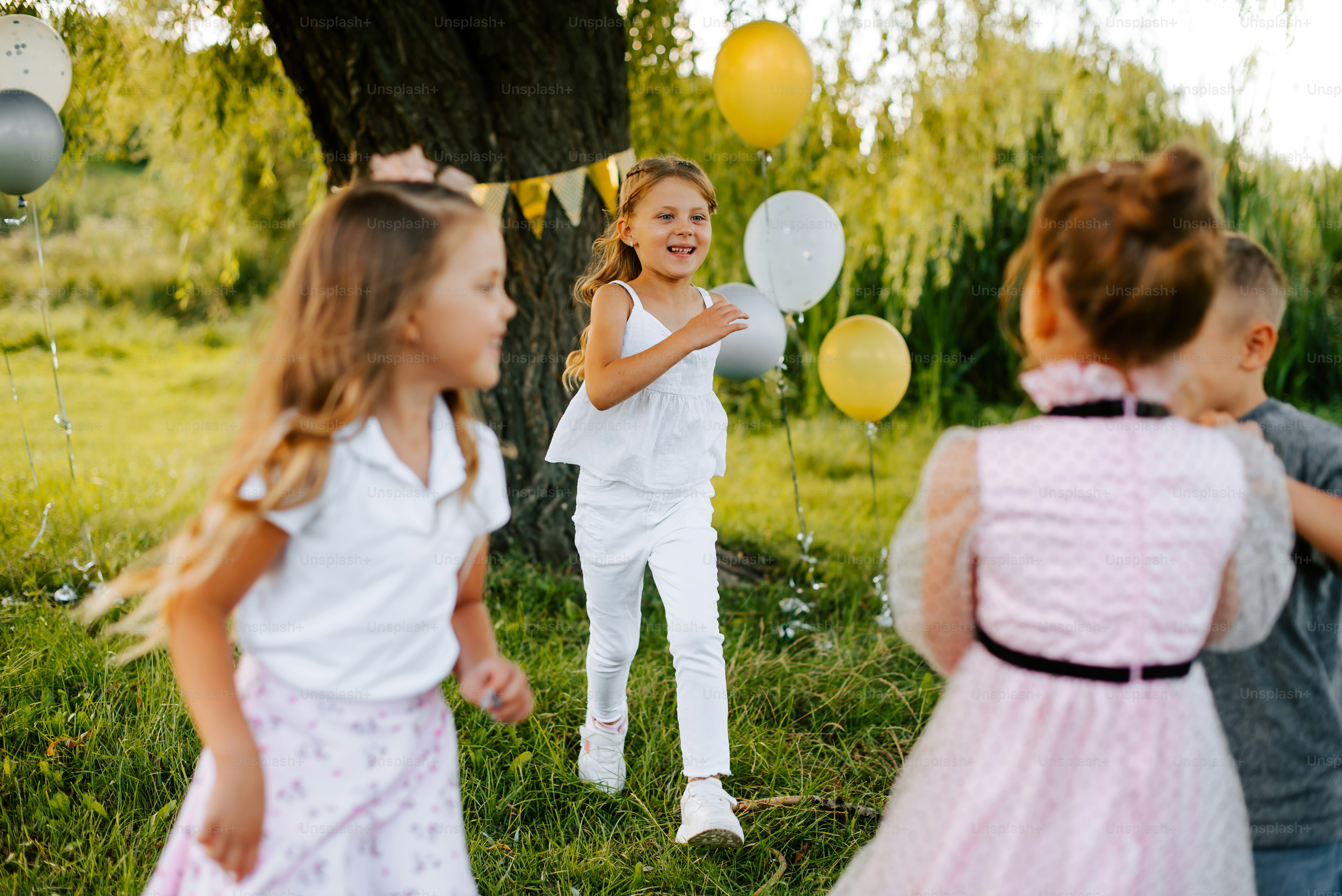 a group of young children standing next to each other