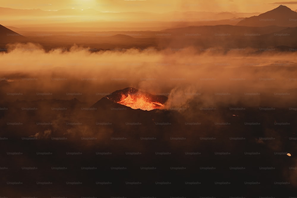 a mountain with a fire in the middle of it