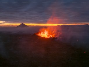 a fire is burning in the middle of a field