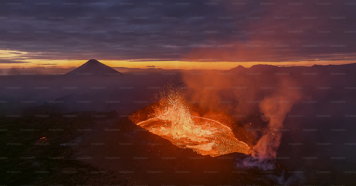 Volcano Sun A volcano erupts lava as the sun sets photo – Wallpaper Image on Unsplash