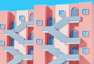 ein rosafarbenes Gebäude mit Treppen, die hinaufführen