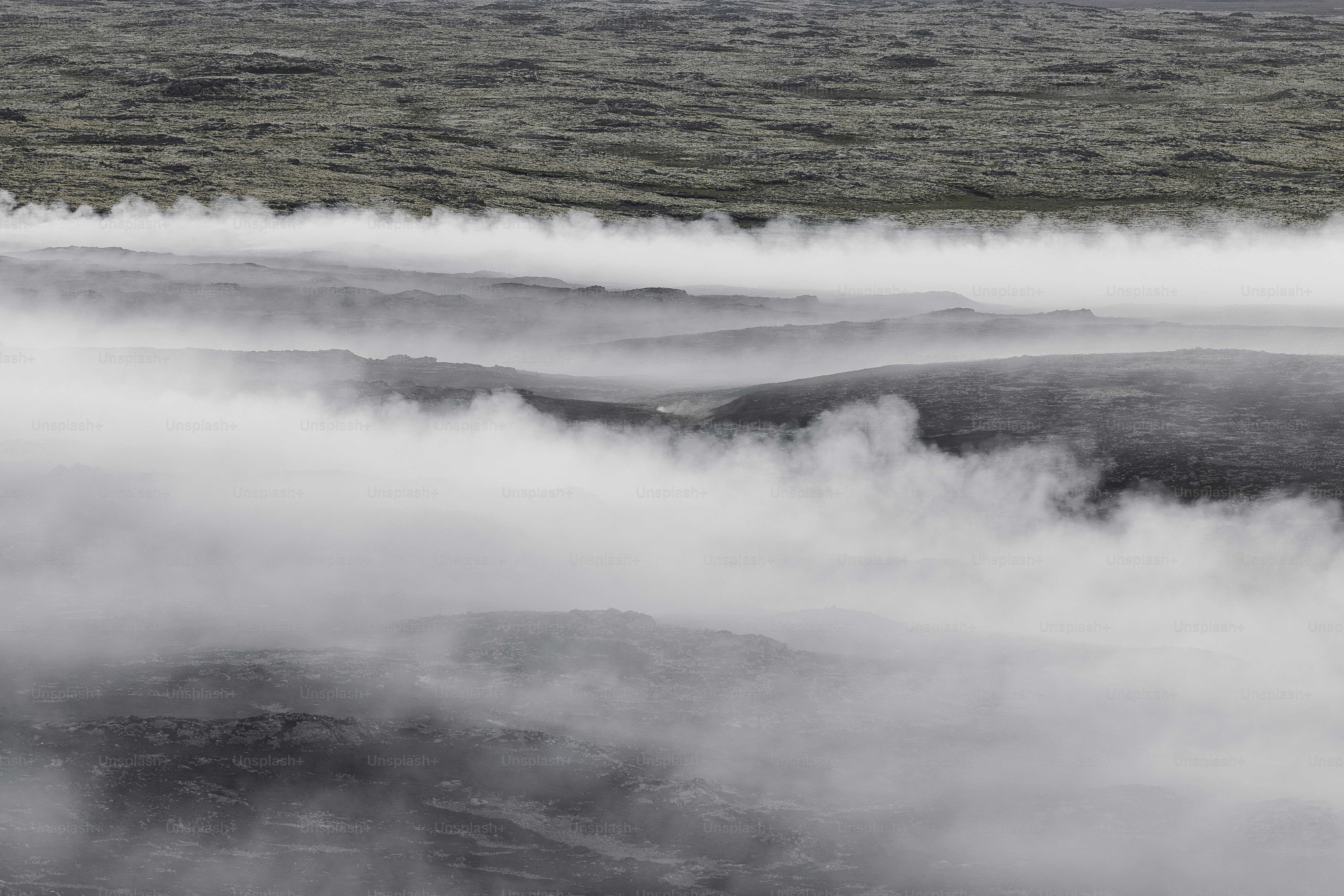 A volcano spewing out lava at sunset photo – Smoke Image on Unsplash