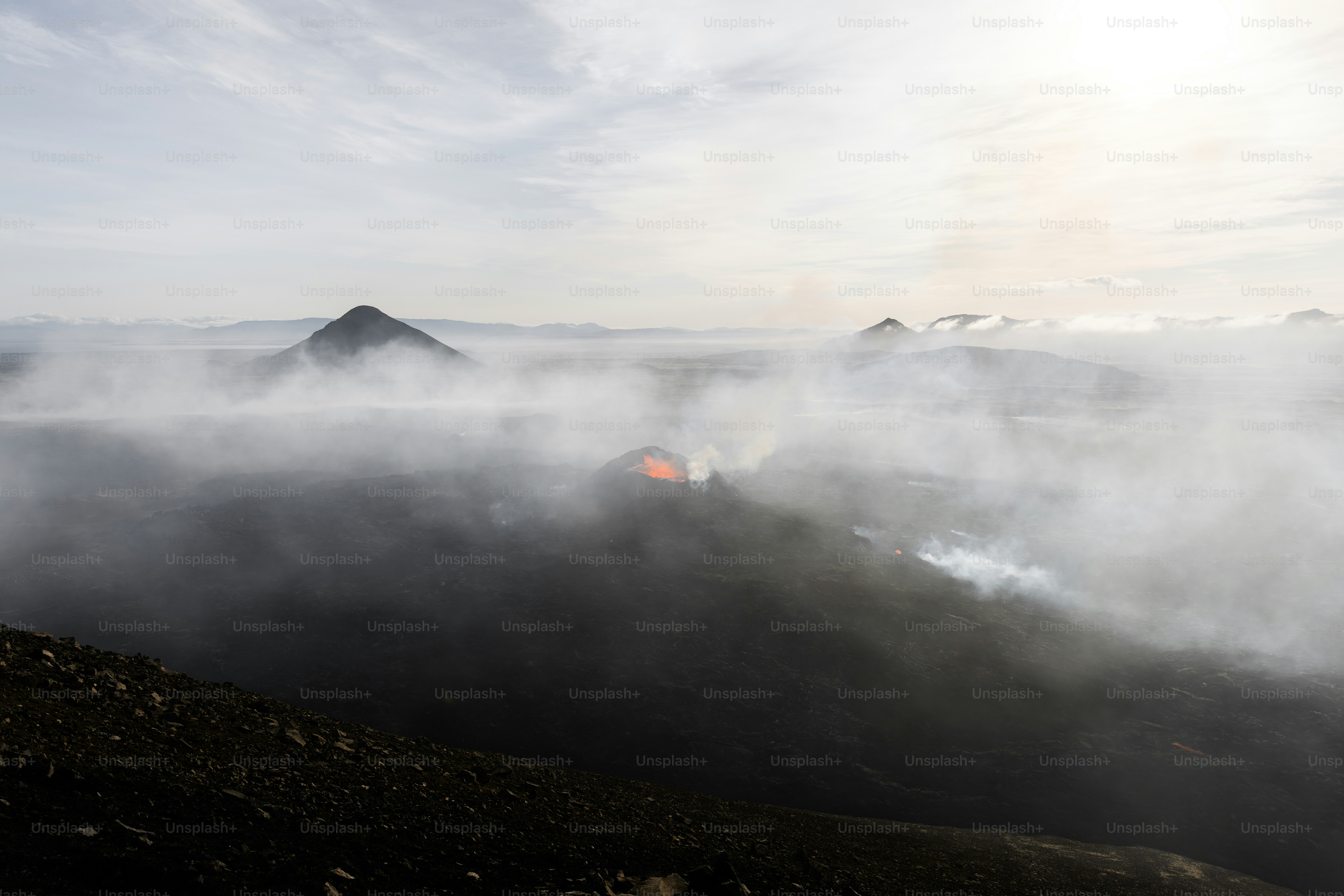 An aerial view of a lava in the ocean photo – Fagradalsfjall Image on ...