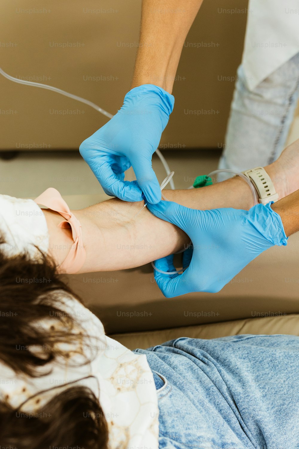 a woman getting her leg examined by a doctor