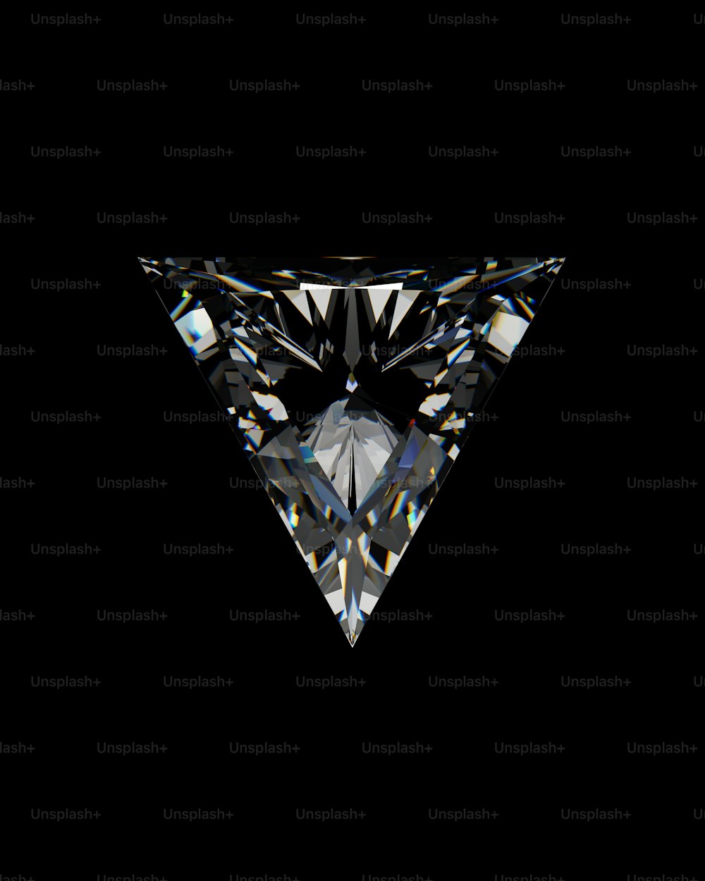 a triangle shaped diamond on a black background