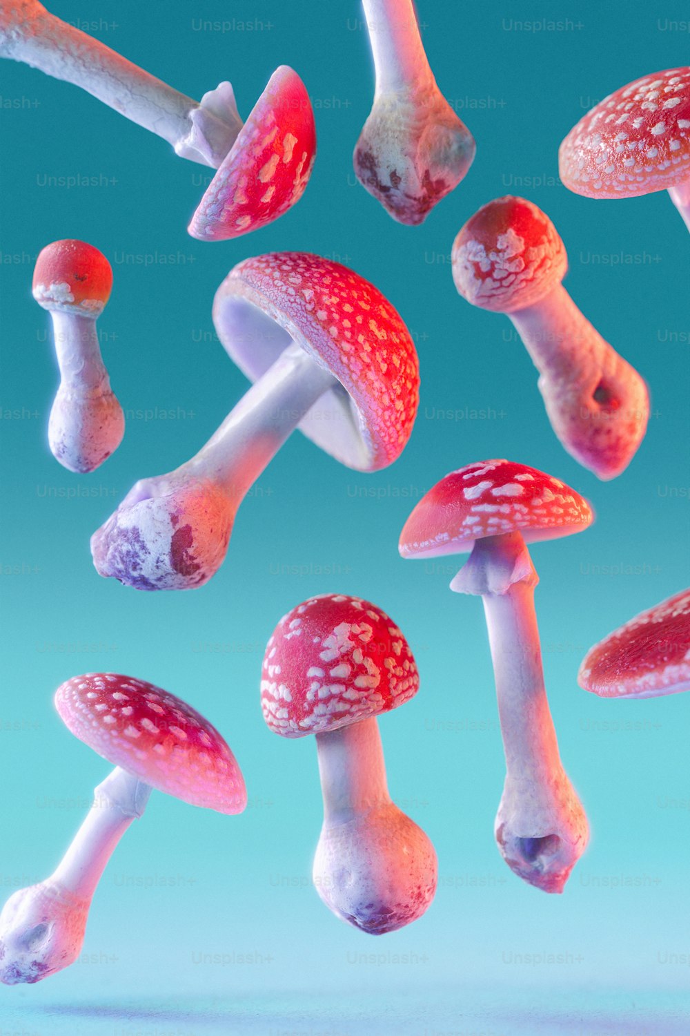 a group of red and white mushrooms floating in the air