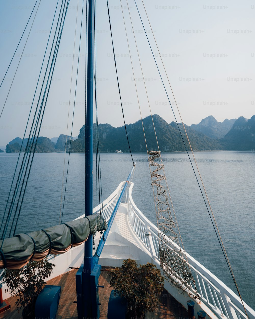 the view from the deck of a boat on the water