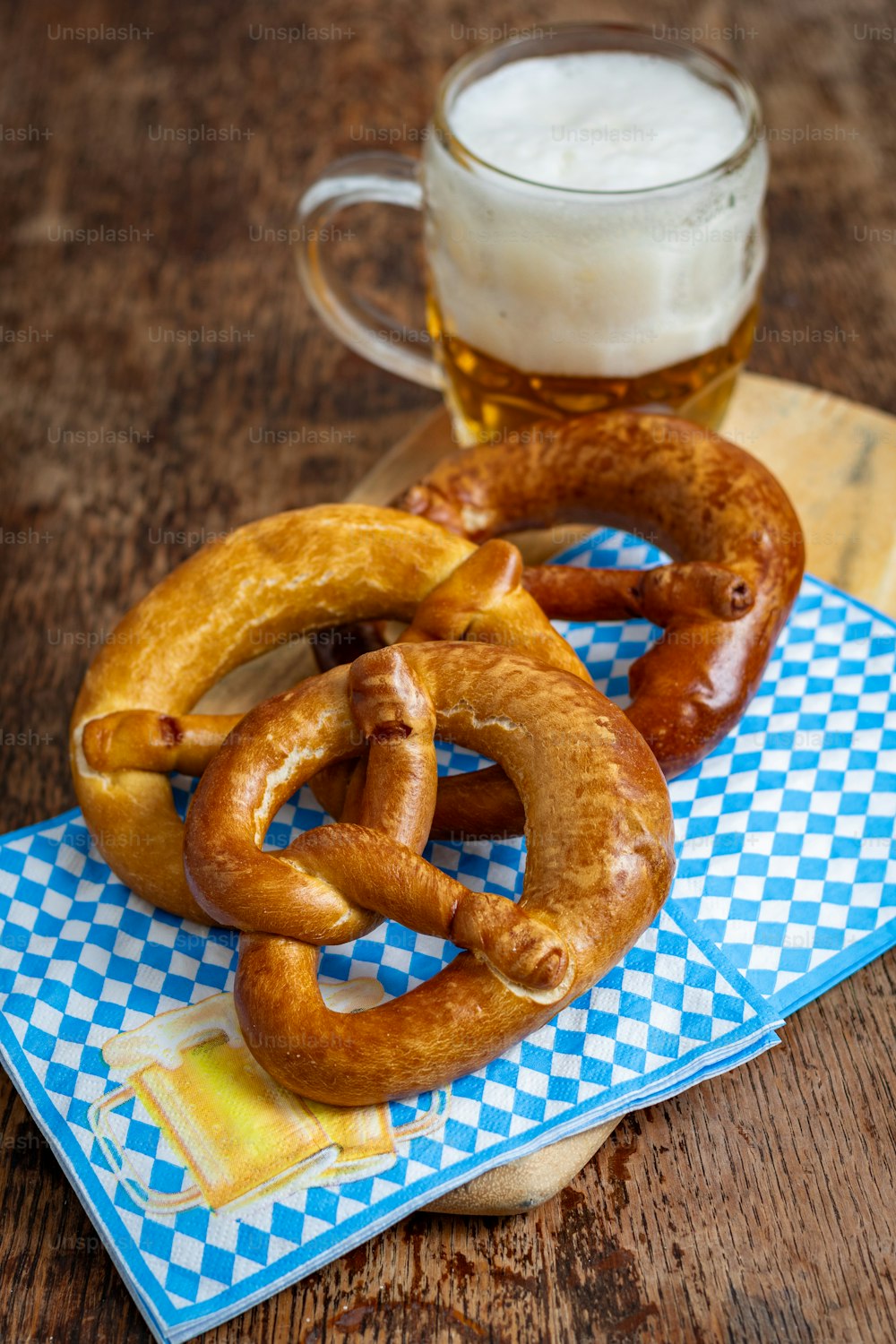 a couple of pretzels sitting on top of a blue napkin