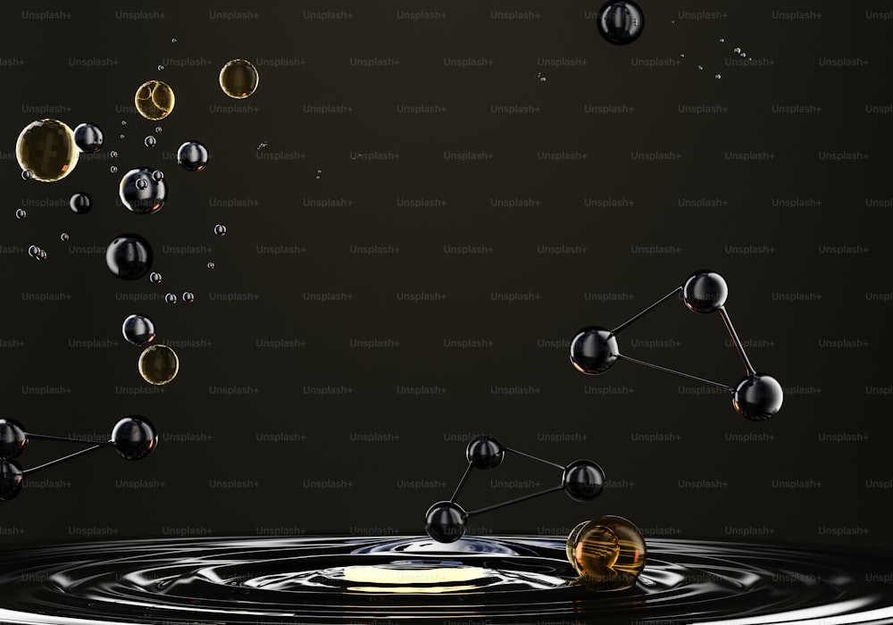 a group of spheres floating on top of a black surface