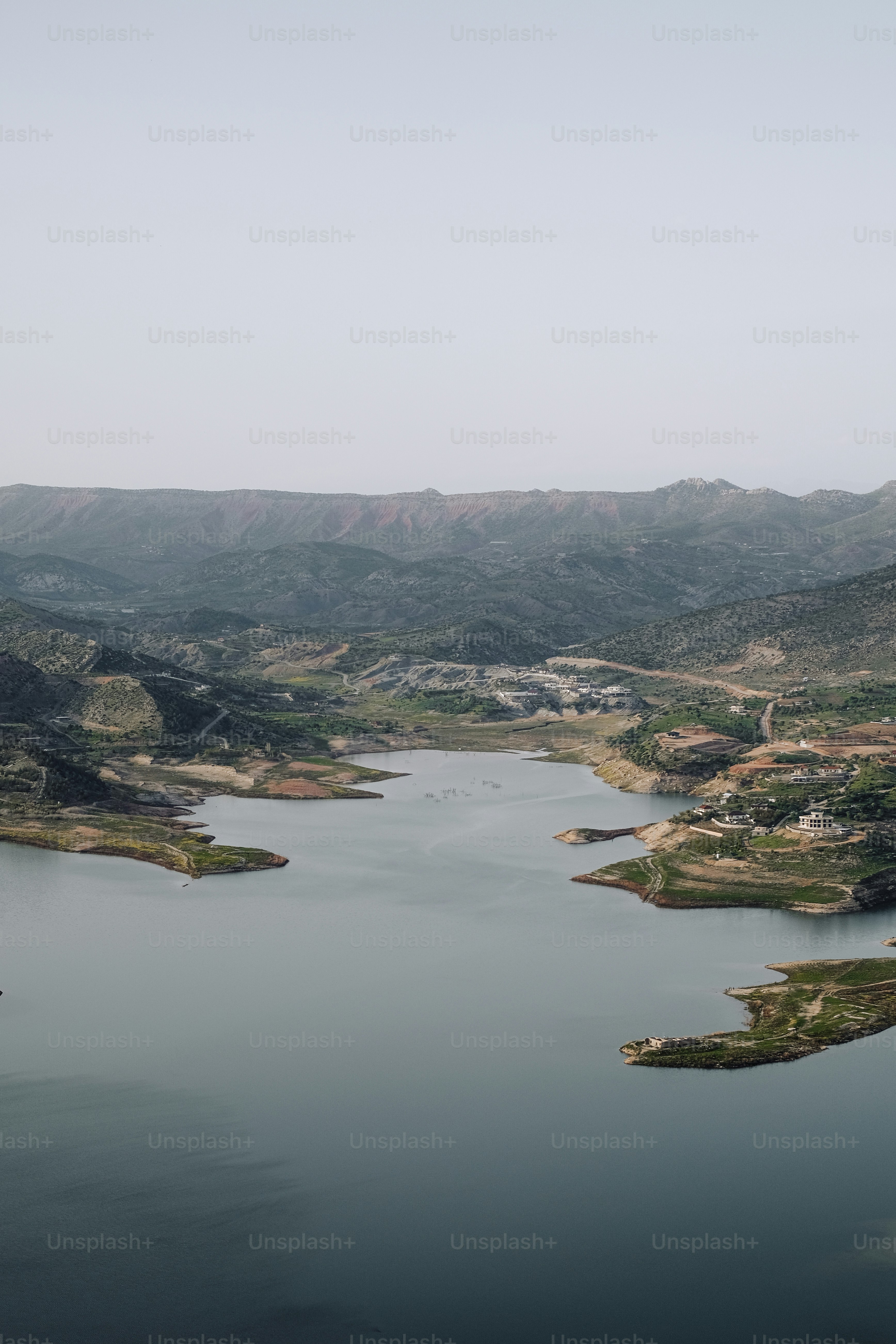 a large body of water surrounded by mountains