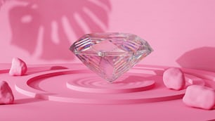 un diamant entouré de pierres roses sur fond rose