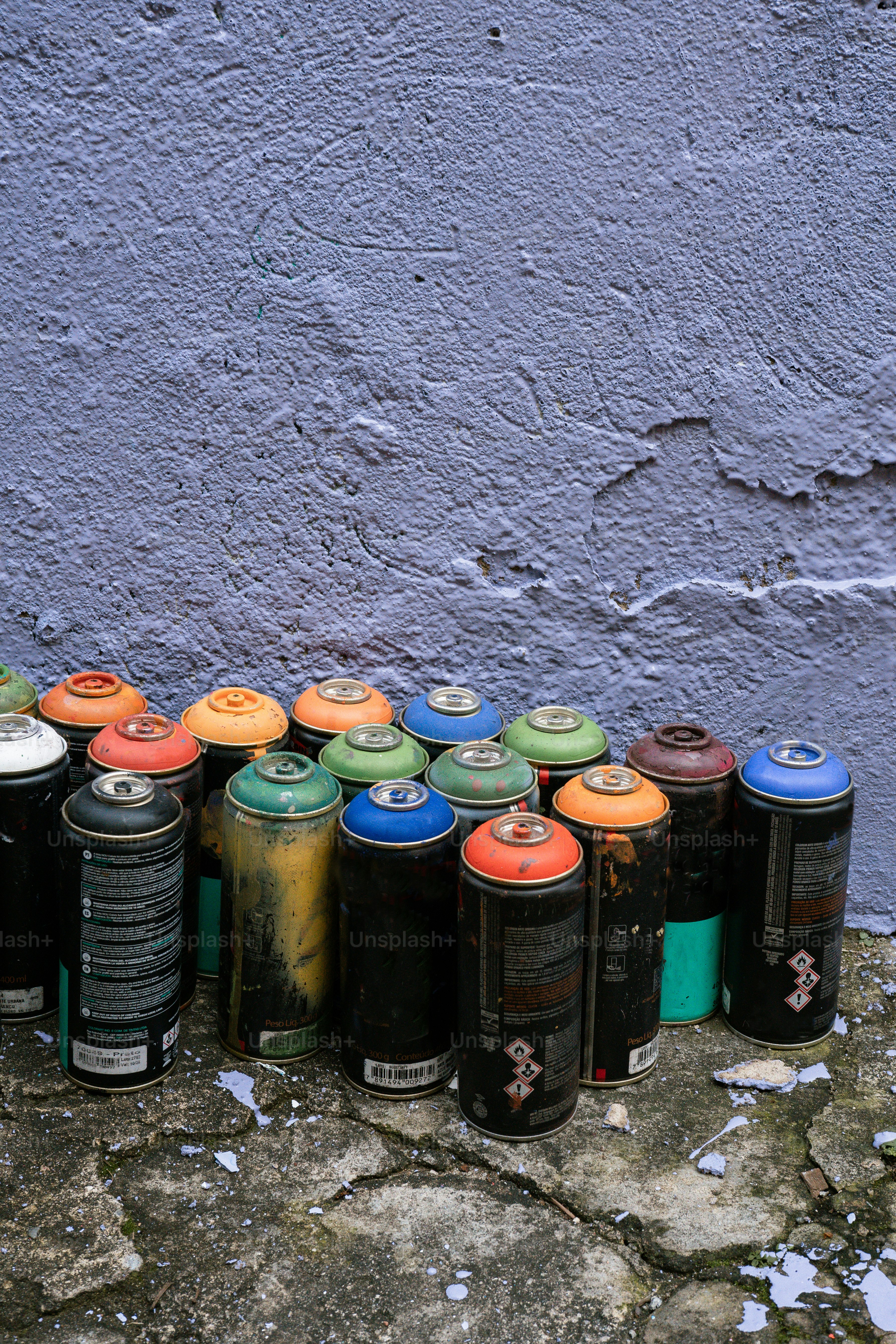 a group of cans of soda sitting next to each other