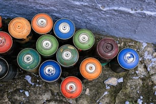 a bunch of cans that are sitting on the ground